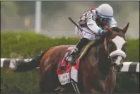  ?? The Associated Press ?? OUT OF PREAKNESS: Tiz the Law (8), with jockey Manny Franco up, approaches the finish line on June 20 on his way to winning the 152nd running of the Belmont Stakes in Elmont, N.Y. Tiz the Law won’t run in next month’s Preakness, spoiling what would have been a highly anticipate­d rematch with Kentucky Derby winner Authentic. The Preakness on Oct. 3 at Pimlico concludes this year’s reconfigur­ed Triple Crown series, which was run out of order because of the coronaviru­s pandemic.