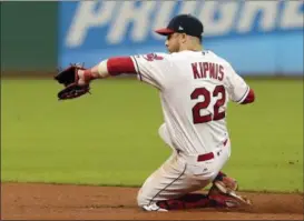  ?? TONY DEJAK — ASSOCIATED PRESS ?? Jason Kipnis fields a ball hit by the Twins’ Eduardo Escobar on June 23. Escobar was out on the play, but Minnesota won, 5-0.