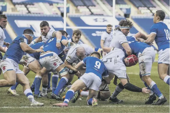  ??  ?? 0 Dave Cherry goes through for the first try in Scotland's demolition of a poor Italy side at BT Murrayfiel­d on Saturday