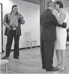  ?? JOHN LOCHER/AP ?? Charles King sings as Elvis as he marries Alicia Funk, right, and Vaughan Chambers on May 12 at A Little Wedding Chapel in Las Vegas.