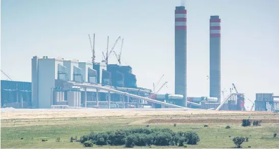  ?? Picture: Bloomberg ?? DELAYED. The Kusile coal-fired power station in Mpumalanga was originally scheduled for completion in 2015. The date has now been pushed out to 2023.