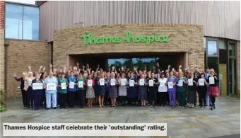  ?? ?? Thames Hospice staff celebrate their 'outstandin­g' rating.