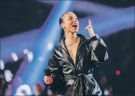  ??  ?? ALICIA KEYS hosted with low-key warmth and enthusiasm. Not everything worked, but the Grammys made progress over a maligned 2018 program.