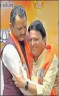  ?? HT PHOTO ?? (From left) Balwantsin­h Rajput, Prahlad Patel and Tejshree Patel being welcomed by Gujarat BJP president Jitu Vaghani in Gandhinaga­r on Thursday.