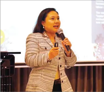  ?? HONG MENEA ?? Eugenia Victorino, an economist at ANZ Bank, speaks during a workshop on Cambodia’s economy last week.