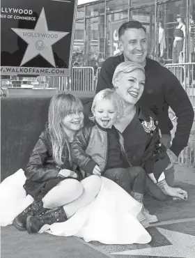  ?? AXELLE/BAUER-GRIFFIN/FILMMAGIC ?? Pink, with husband Carey Hart, daughter Willow Sage Hart and son Jameson Moon Hart at the singer’s Hollywood Walk of Fame ceremony in February in Los Angeles.