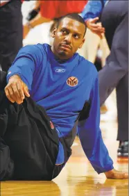  ?? Jonathan Daniel / Getty Images ?? Anfernee Hardaway of the New York Knicks stretches before the game against the Chicago Bulls at United Center on March 20, 2004 in Chicago.