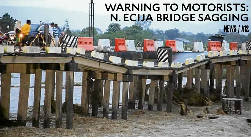 WARNING TO MOTORISTS: N. ECIJA BRIDGE SAGGING - PressReader