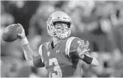 ?? MARK J. TERRILL/AP ?? UCLA quarterbac­k Josh Rosen, above, draws many comparison­s with Eli Manning ... and even some with Eli’s brother Peyton.