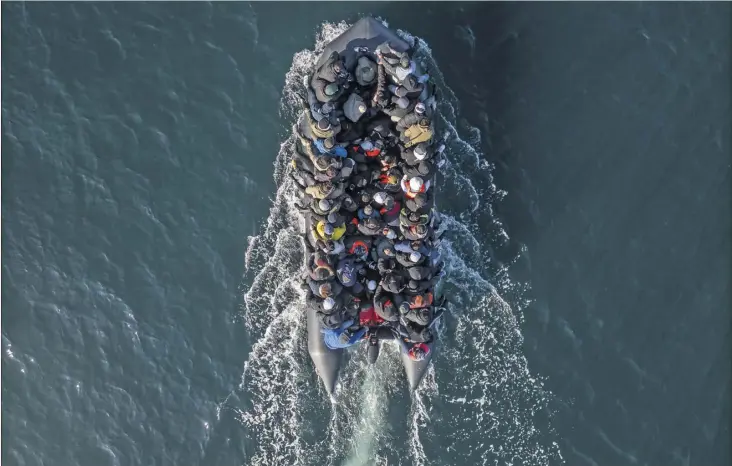  ?? PHOTOGRAPH: DAN KITWOOD/GETTY ?? Migrants off the coast of Dover last month