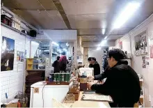  ?? Korea Times photo by Lee Hae-rin ?? Diners enjoy Japanese food and drinks at Tetsuro Seoul, a Japan-themed dining pub near Seoul Station, Monday.