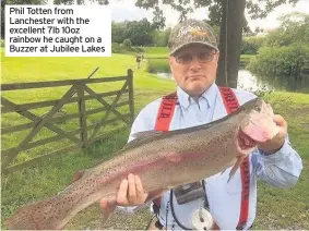  ??  ?? Phil Totten from Lanchester with the excellent 7lb 10oz rainbow he caught on a Buzzer at Jubilee Lakes