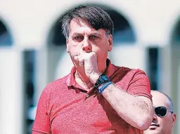  ?? FOTO: AFP ?? Jair Bolsonaro se mostró incrédulo desde el inicio de la pandemia.