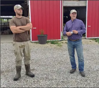  ?? Staff photo/Bob Tomaszewsk­i ?? Jordan and John J. Settlage show off the conservati­on practices they have in place on their farms during a tour Thursday throughout Auglaize County.