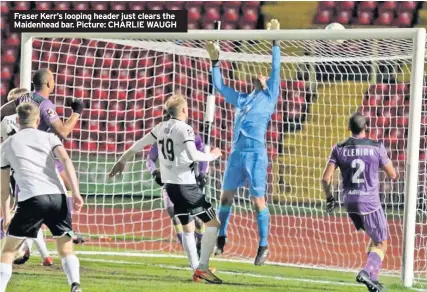  ??  ?? Fraser Kerr’s looping header just clears the Maidenhead bar. Picture: CHARLIE WAUGH