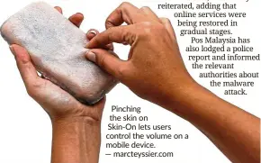  ??  ?? Pinching the skin on Skin-on lets users control the volume on a mobile device. — marcteyssi­er.com