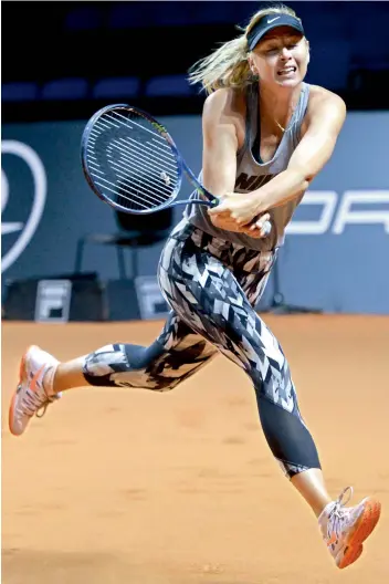  ??  ?? Maria Sharapova returns during a training session at the WTA Porsche Tennis Grand Prix in Stuttgart, Germany, on Wednesday.