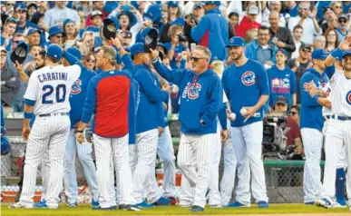  ?? THE ASSOCIATED PRESS ?? The Chicaco Cubs return to the postseason looking to repeat as World Series Champions.