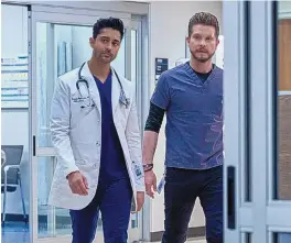  ?? TOM GRISCOM/FOX ?? From left, Manish Dayal and Matt Czuchry in a scene from “The Resident.”