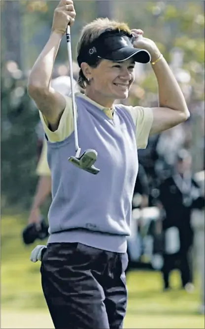  ??  ?? Catriona Matthew celebrates holing the Solheim Cup-winning putt at Barseback in 2003