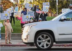  ?? Samantha Laurey/Special to The Chronicle ?? People turn out in Benicia last Wednesday to protest Valero Energy Corp.’s contributi­ons of tens of thousands of dollars in local elections.