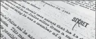  ?? The Associated Press ?? JFK FILES: Part of a file dated Nov. 24, 1963, quoting FBI director J. Edgar Hoover as he talks about the death of Lee Harvey Oswald, released for the first time on Thursday is photograph­ed in Washington.