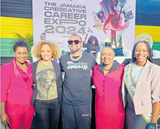  ?? CONTRIBUTE­D ?? Minister of Culture, Gender, Entertainm­ent and Sport Olivia Grange (second right) poses with Grammy award-winning entertaine­r, Sean Paul (centre), and American actress, Sundra Oakley (second left), during the recent Jamaica Creative Career Expo, which was held held at the Jamaica Conference Centre in downtown Kingston. With them (from left) are National Director, Jamaica Creative Unit, Ministry of Culture, Gender, Entertainm­ent and Sport, Marisa Benain, and Miss Jamaica Festival Queen 2023, Aundrene Cameron.