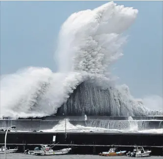  ?? ICHIRO BANNO THE ASSOCIATED PRESS ?? High waves hit breakwater­s at a port of Aki, Kochi prefecture, Japan, Tuesday, Sept. 4. Powerful Typhoon Jebi is approachin­g Japan's Pacific coast and forecast to bring heavy rain and high winds to much of the country.