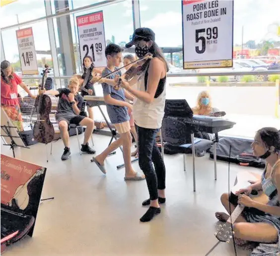  ?? ?? Whakaaro Tahi Community Trust music students perform at Pak ‘n Save, Kaitaia.