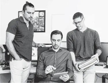  ?? Caleb Thal / New York Times ?? Rick Strom, from left, Michael Eng and Tom Akel started Graphite Comics, a new platform seeking to offer digital comics from all formats, including independen­t creators as well as major publishers.