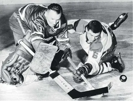  ?? MONTREAL GAZETTE FILES ?? Toronto Maple Leafs goaltender Johnny Bower reaches out with his famous poke check to knock the puck away from Montreal Canadiens’ forward Ralph Backstrom during a game in 1964.