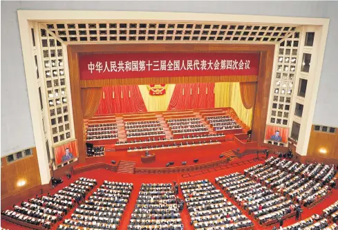  ?? REUTERS ?? Chinese Premier Li Keqiang speaks at the opening session of the National People’s Congress at the Great Hall of the People in Beijing yesterday.