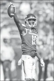  ?? NWA Democrat-Gazette/CHARLIE KAIJO ?? Arkansas receiver Jordan Jones reacts after making a first down Saturday in Fayettevil­le.