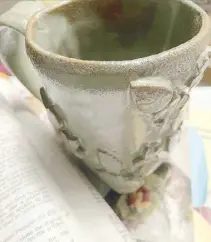  ?? ?? I drink my brewed, dark-roasted Arabica out of a mug I made myself at Tahanan Pottery.