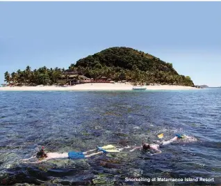  ??  ?? Snorkellin­g at Matamanoa Island Resort