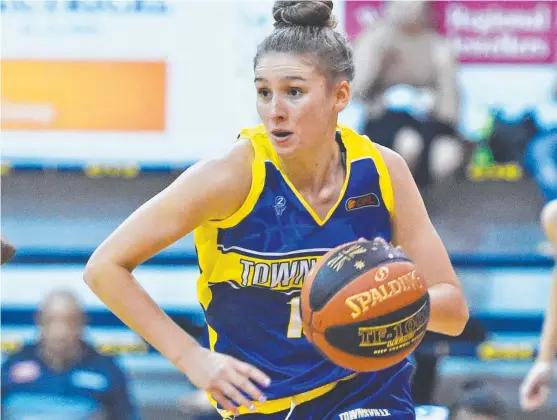  ?? SUPERB: Miela Goodchild scored a game- high 23 points for the Flames against the Brisbane Capitals last night. Picture: ZAK SIMMONDS ??