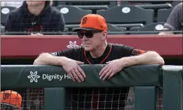  ?? ROSS D. FRANKLIN — THE ASSOCIATED PRESS FILE ?? San Francisco Giants manager Bob Melvin watches his players during the first inning of a spring training game against the Chicago Cub on Feb. 24in Scottsdale, Ariz.