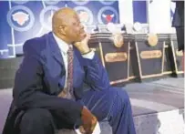  ?? AP ?? Patrick Ewing takes in scene at NBA draft lottery.