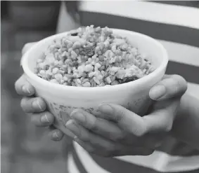  ?? ELLAIRD PHOTOGRAPH­Y ?? Hearty Three-Grain Salad, from Vegan al Fresco: Happy & Healthy Recipes for Picnics, Barbecues & Outdoor Dining, gets some sweetness from raspberrie­s and dried cranberrie­s.