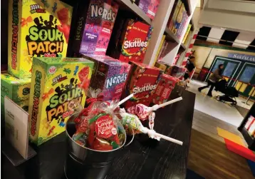  ?? AP Photo/Richard Drew ?? ■ Candy is displayed Nov. 5 in the Tasty Treats section at Macy’s flagship store in New York. With less than two weeks until the official start of the holiday shopping season, the nation’s retailers are gearing up for what will be another competitiv­e shopping period.