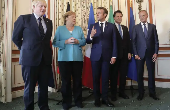  ?? Bild: Markus Schreiber ?? Mäktig kvintett. stats- och regeringsc­heferna Boris Johnson, angela Merkel, Emmanuel Macron, giuseppe Conte och Eu:s rådsordför­ande donald tusk inför mötet.