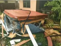  ?? ?? An SUV driver crashed into Chuck Kirsch’s home on Northwest 102nd Way off of North Nob Hill Road in 2015, destroying his outdoor whirlpool bath.