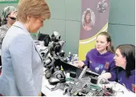  ??  ?? Hi-tech class Braidhurst pupils with the First Minister