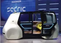  ??  ?? JAMIE KEATEN/AP PHOTO IMUT: Sedric menjadi salah satu konsep Volkswagen di lini self driving car yang dipamerkan di Geneva Motor Show.