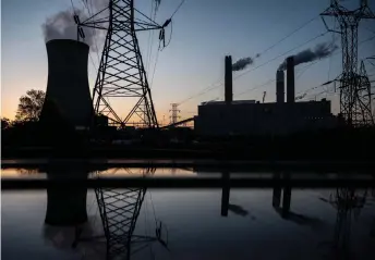  ?? — AFP photos by Andrew Caballero-Reynolds ?? Steam rises from the Miller coal Power Plant in Adamsville, Alabama.