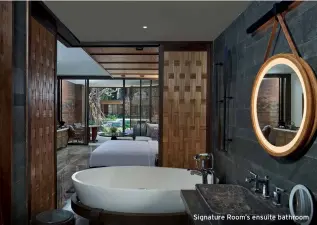  ??  ?? Signature Room’s ensuite bathroom