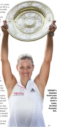  ??  ?? GERMANY’s Angelique Kerber poses with the winner’s trophy, the Venus Rosewater Dish.