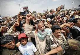  ?? HANI MOHAMMED / ASSOCIATED PRESS ?? Houthi Shiite mourners chant slogans Saturday as they attend the funeral of Saleh alSamad, a senior Houthi official who was killed by a Saudi-led coalition airstrike on April 19, in Sanaa, Yemen. The Houthis are backed by Iran.