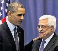  ?? AP ( 2) ?? Sein Kurs gegenüber Israel hat Obama Sympathien gekostet. Abbas empfängt ihn betont kühl, Aktivisten protestier­en