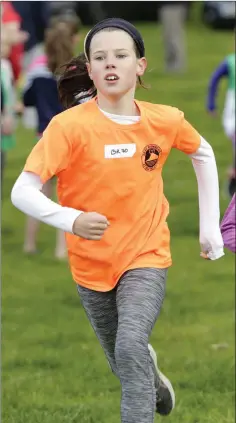  ??  ?? Alannah Valbert from Bray Runners makes a last sprint in the under-10s race at the Wicklow Evens Ages Cross Country Championsh­ips in Roundwood.